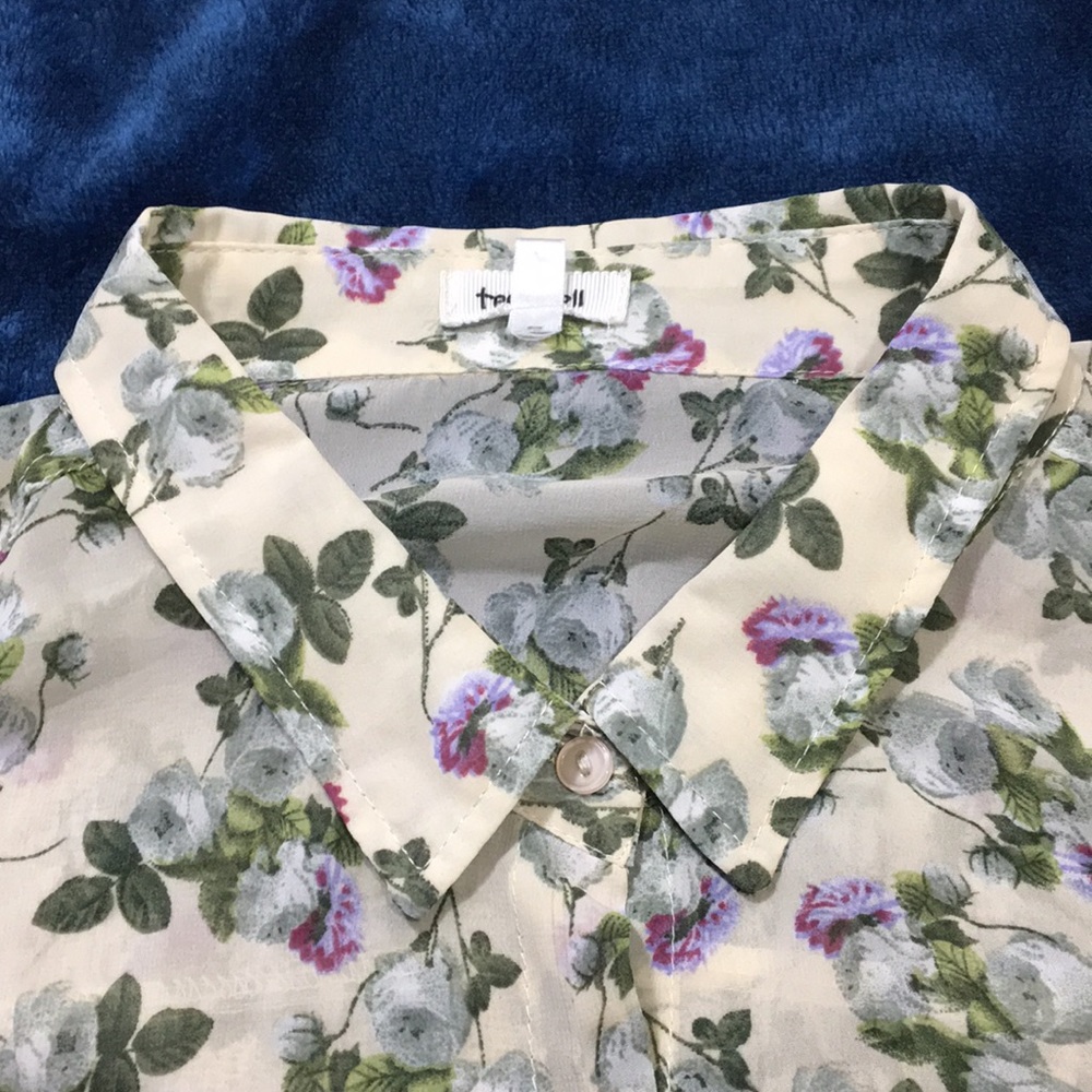 Sheer sleeveless button top